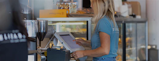 Person using laptop, illustrating Rothbury cyber liability insurance.